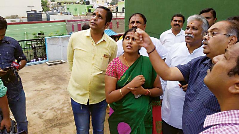 Mayor Gangambike at the spot in Mathikere where a 13-year-old was electrocuted by a live wire Mayor Gangambike at the spot in Mathikere where a 13-year-old was electrocuted by a live wire