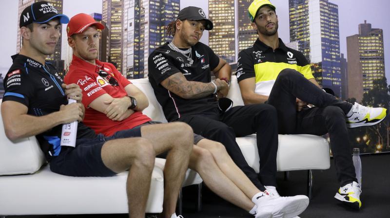 Formula One drivers (from left) Williams' Nicholas Latifi of Canada, Ferrari's Sebastian Vettel of Germany, Mercedes' Lewis Hamilton of Britain and Renault's Daniel Ricciardo of Australia attend pre-race a press conference at the Australian Formula One Grand Prix in Melbourne on Thursday. AP Photo Formula One drivers (from left) Williams' Nicholas Latifi of Canada, Ferrari's Sebastian Vettel of Germany, Mercedes' Lewis Hamilton of Britain and Renault's Daniel Ricciardo of Australia attend pre-race a press conference at the Australian Formula One Grand Prix in Melbourne on Thursday. AP Photo
