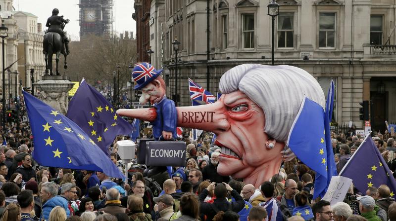 An effigy of British Prime Minister Theresa May is wheeled through Trafalgar Square during a Peoples Vote anti-Brexit march in London. (Photo:AP) An effigy of British Prime Minister Theresa May is wheeled through Trafalgar Square during a Peoples Vote anti-Brexit march in London. (Photo:AP)