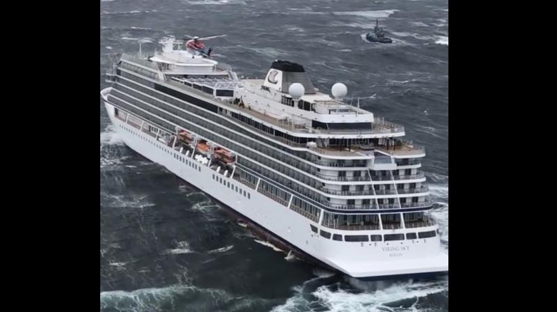 Helicopters fly over the cruise ship Viking Sky after it sent out a Mayday signal because of engine failure in windy conditions. (Photo:AP) Helicopters fly over the cruise ship Viking Sky after it sent out a Mayday signal because of engine failure in windy conditions. (Photo:AP)