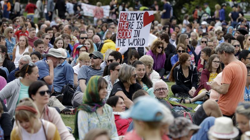 People gather at Haley Park for the "March for Love" following last week's mosque attacks in Christchurch. (Photo: AP) People gather at Haley Park for the "March for Love" following last week's mosque attacks in Christchurch. (Photo: AP)