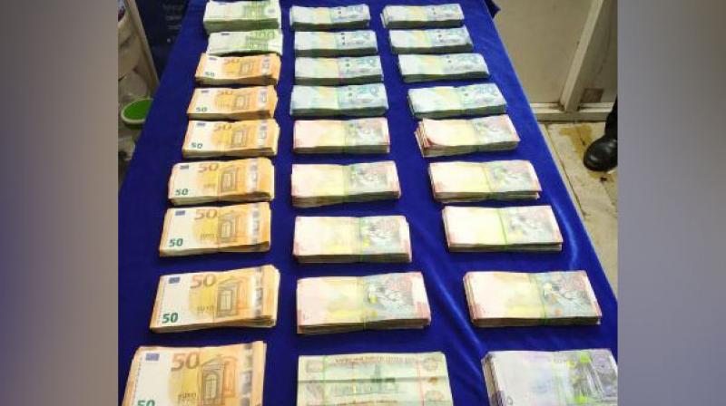 AIU also revealed that the passenger informed them that he had received the currency from an unknown person in the aerobridge area. (Photo: ANI) AIU also revealed that the passenger informed them that he had received the currency from an unknown person in the aerobridge area. (Photo: ANI)