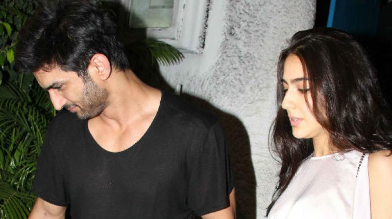 Sushant Singh Rajput and Sara Ali Khan were recently spotted along with their director Abhishek Kapoor over dinner. Sushant Singh Rajput and Sara Ali Khan were recently spotted along with their director Abhishek Kapoor over dinner.