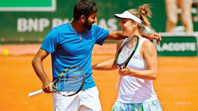 Bopanna pairing with Canadian partner Gabriela Dabrowski, defeated the pair of British Heather Watson and Finland's Henri Kontinen in a hard fought match. (Photo: AFP) Bopanna pairing with Canadian partner Gabriela Dabrowski, defeated the pair of British Heather Watson and Finland's Henri Kontinen in a hard fought match. (Photo: AFP)