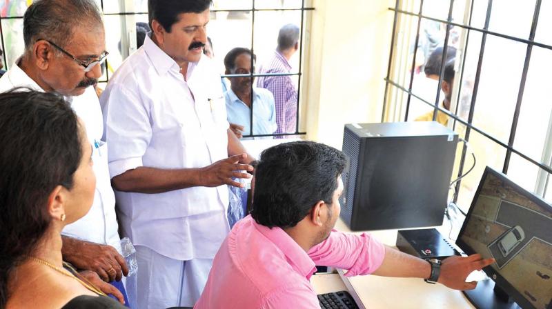 Transport minister A.K. Saseendran during the inauguration of the automated driving test yard at Muttathara on Thursday. MLA V. S. Sivakumar looks on. (Photo: DC) Transport minister A.K. Saseendran during the inauguration of the automated driving test yard at Muttathara on Thursday. MLA V. S. Sivakumar looks on. (Photo: DC)