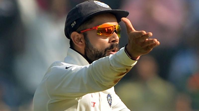 Virat Kohli has found himself embroiled in a controversy over his "I don't think you should live in India" response to an enthusiast who called the skipper overrated while expressing his admiration for English and Australian batsmen. (Photo: AFP) Virat Kohli has found himself embroiled in a controversy over his "I don't think you should live in India" response to an enthusiast who called the skipper overrated while expressing his admiration for English and Australian batsmen. (Photo: AFP)