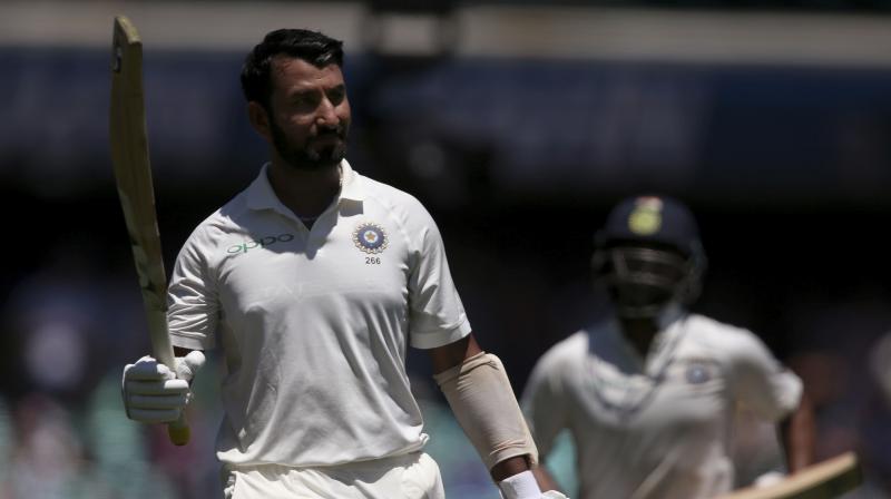 Cheteshwar Pujara scored a magnificent 193 as India turned the screws on Australia in the fourth Test in Sydney. (Photo: AP) Cheteshwar Pujara scored a magnificent 193 as India turned the screws on Australia in the fourth Test in Sydney. (Photo: AP)