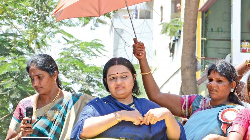 MGR Amma Deepa Peravai leader Deepa campaigns at RK Nagar with an umbrella on Thursday (Photo: DC) MGR Amma Deepa Peravai leader Deepa campaigns at RK Nagar with an umbrella on Thursday (Photo: DC)