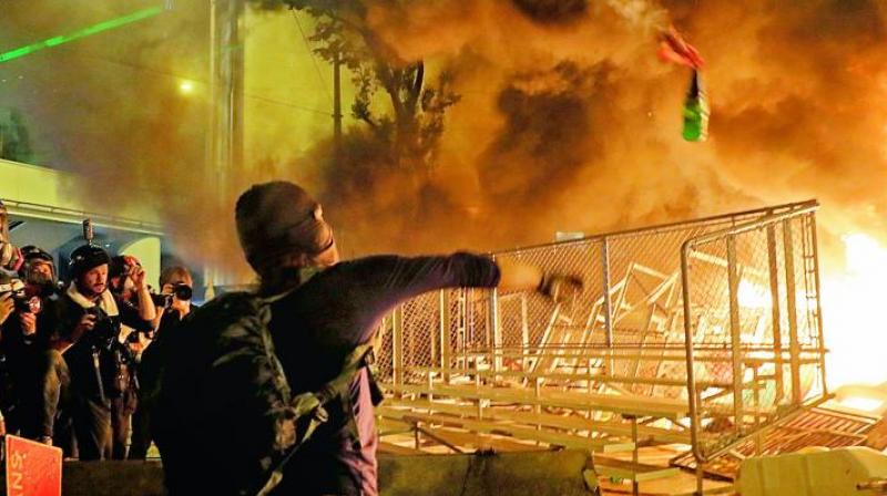 The mass agitation which has entered its 15th week was triggered by the now-repealed extradition bill, with the protest showing no sign of abating. (Photo: AP) The mass agitation which has entered its 15th week was triggered by the now-repealed extradition bill, with the protest showing no sign of abating. (Photo: AP)