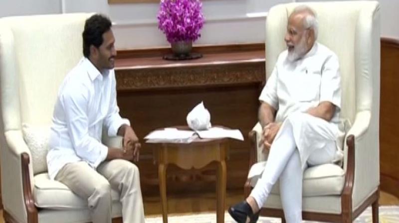 Reddy presented Prime Minister with a bouquet and shawl. (Photo: ANI) Reddy presented Prime Minister with a bouquet and shawl. (Photo: ANI)