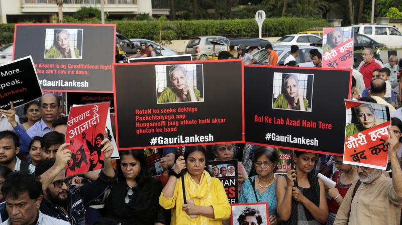 The killing of the Indian journalist has provoked outrage and anguish across the country, with thousands protesting what they see as an effort to silence critics of India's ruling Hindu nationalist party. (Photo: AP) The killing of the Indian journalist has provoked outrage and anguish across the country, with thousands protesting what they see as an effort to silence critics of India's ruling Hindu nationalist party. (Photo: AP)