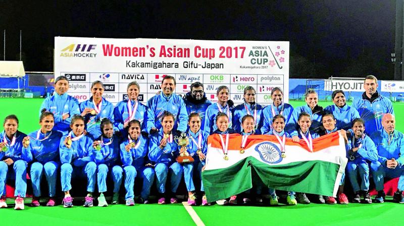 Indian women’s hockey team members pose with their medals and trophy after beating China to win the Asia Cup hockey title in Kakamigahara, Japan, on Sunday. (Photo: AP) Indian women’s hockey team members pose with their medals and trophy after beating China to win the Asia Cup hockey title in Kakamigahara, Japan, on Sunday. (Photo: AP)