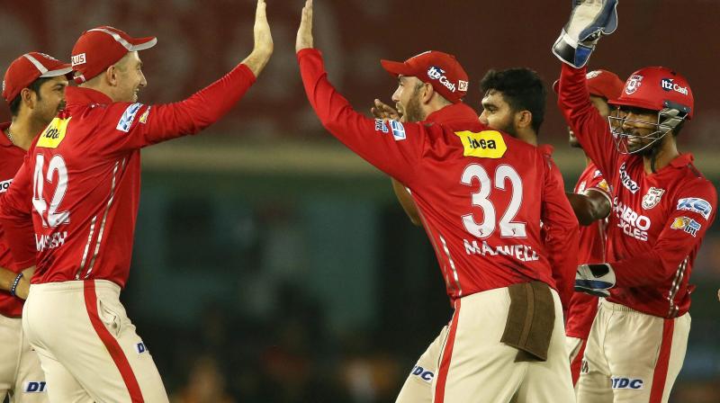 Shaun Marsh of Kings XI Punjab is congratulated by Kings XI Punjab captain Glenn Maxwell for taking the catch to get Kolkata Knight Riders captain Gautam Gambhir wicket in Mohali on Tuesday. (Photo: AP) Shaun Marsh of Kings XI Punjab is congratulated by Kings XI Punjab captain Glenn Maxwell for taking the catch to get Kolkata Knight Riders captain Gautam Gambhir wicket in Mohali on Tuesday. (Photo: AP)