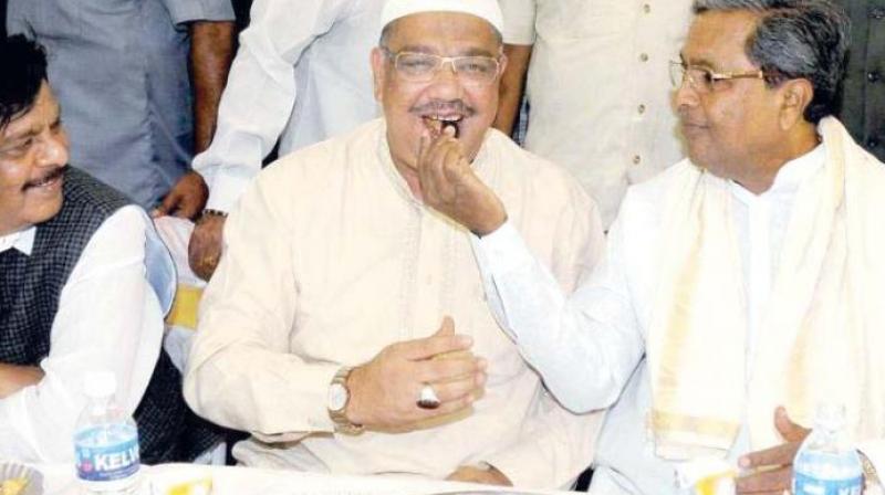 A file photo of Chief Minister Siddaramaiah with Primary and Secondary Education Minister Tanveer Sait. A file photo of Chief Minister Siddaramaiah with Primary and Secondary Education Minister Tanveer Sait.