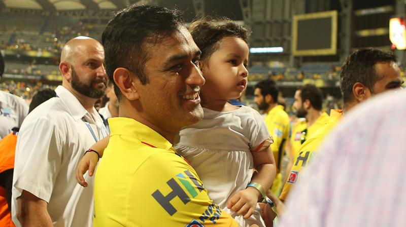 During the team photograph later on, four-year-old Ziva ran towards her father before he twirled her around. (Photo: BCCI) During the team photograph later on, four-year-old Ziva ran towards her father before he twirled her around. (Photo: BCCI)