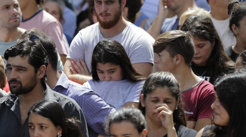 Through the morning, mourners gathered for a public vigil in a gymnasium in Progreso, the small farming town in Santa Fe province which Sala left as a teenager to play in Europe. (Photo: AP) Through the morning, mourners gathered for a public vigil in a gymnasium in Progreso, the small farming town in Santa Fe province which Sala left as a teenager to play in Europe. (Photo: AP)