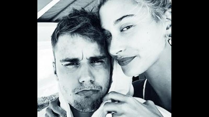 According to www.justjared.com, the 22-year-old model shared a cute selfie of her and her 25-year-old singer husband while on vacation. According to www.justjared.com, the 22-year-old model shared a cute selfie of her and her 25-year-old singer husband while on vacation.