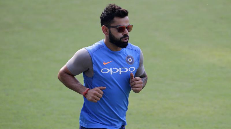 Virat Kohli ensured that the TV crew member got proper treatment before he resumed his practice. (Photo: AP) Virat Kohli ensured that the TV crew member got proper treatment before he resumed his practice. (Photo: AP)