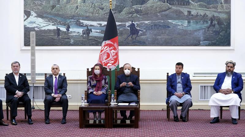 Afghan President Ashraf Ghani, third from right, attends a ceremony of Indias AstraZeneca coronavirus vaccination at the Afghan presidential palace in Kabul, Afghanistan, Tuesday, Feb. 23, 2021. (The Presidential Palace via AP)