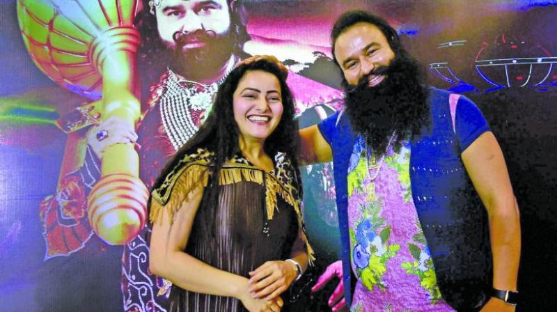 Gurmeet Ram Rahim Singh's adopted daughter Honeypreet Singh top the list of 43 most wanted people in Haryana over the rioting on August 25. (Photo: File PTI) Gurmeet Ram Rahim Singh's adopted daughter Honeypreet Singh top the list of 43 most wanted people in Haryana over the rioting on August 25. (Photo: File PTI)