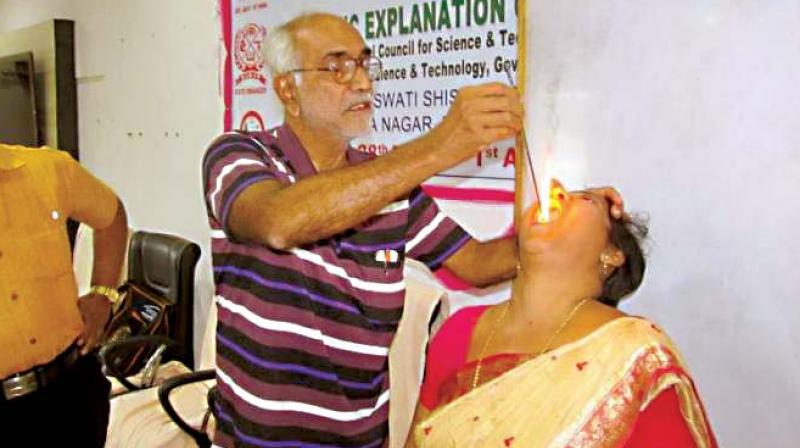 Rationalist Nayak shows people how godmen and fraudsters cheat them. Rationalist Nayak shows people how godmen and fraudsters cheat them.