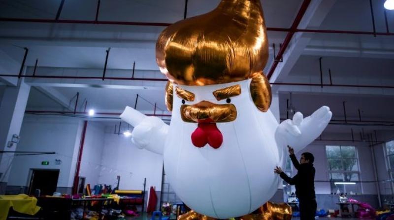 Yifang Inflatables, a factory in the city of Jiaxing, near Shanghai, began selling the inflatables after images of a large sculpture of a similar design outside a shopping center in the northern city of Taiyuan went viral on social media last month. (Photo: AFP) Yifang Inflatables, a factory in the city of Jiaxing, near Shanghai, began selling the inflatables after images of a large sculpture of a similar design outside a shopping center in the northern city of Taiyuan went viral on social media last month. (Photo: AFP)