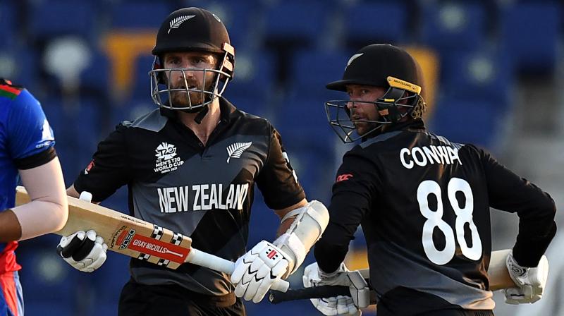 New Zealands Devon Conway (right) and teammate captain Kane Williamson run between the wickets during the ICC mens Twenty20 World Cup cricket match between New Zealand and Afghanistan at the Sheikh Zayed Cricket Stadium in Abu Dhabi on Sunday. (Photo: AFP)