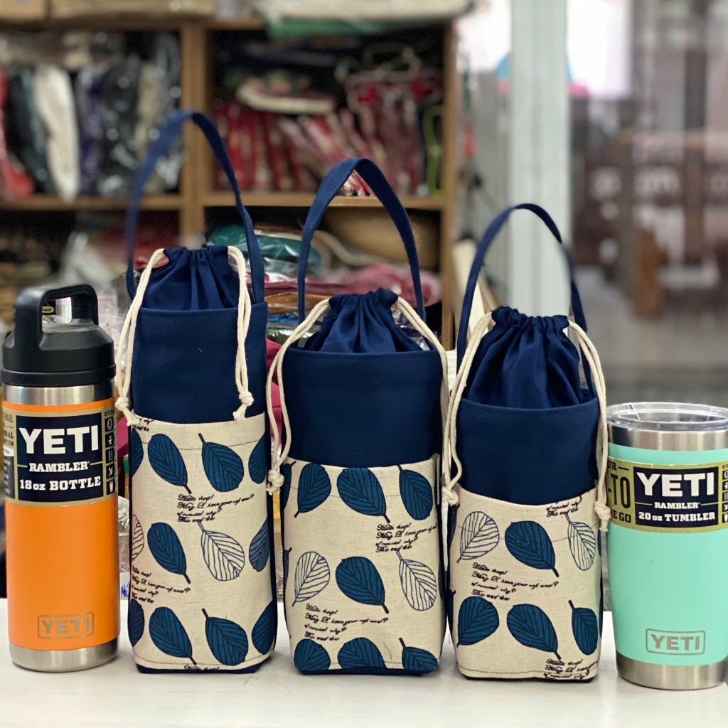 Túi vải hoặc ly giữ nhiệt in logo trường