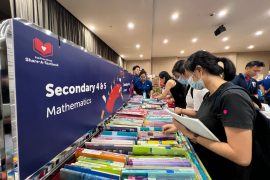 Beneficiaries choosing textbooks from Share-A-Textbook 2024