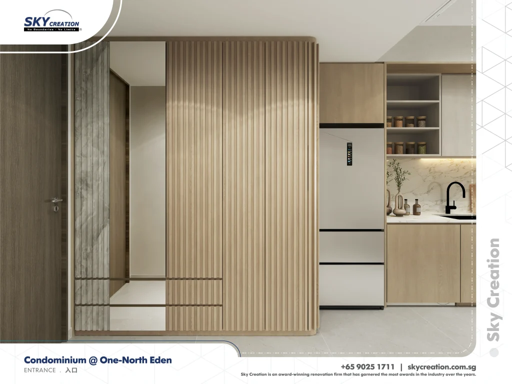 One-North Eden entrance with a tall mirror and vertically grooved cabinet fronts