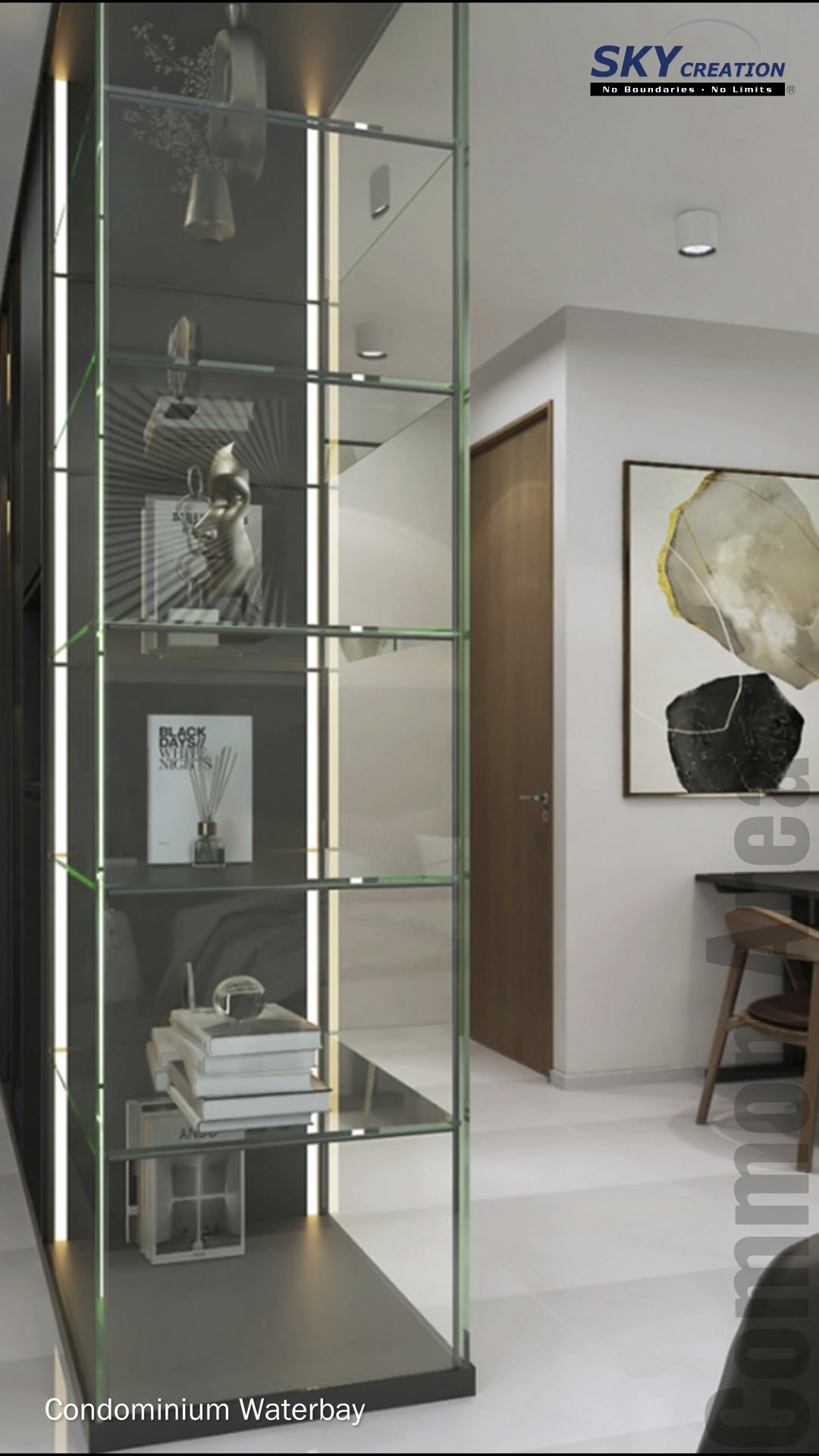 Waterbay study corner beside a tall mirrored display cabinet with illuminated glass shelves