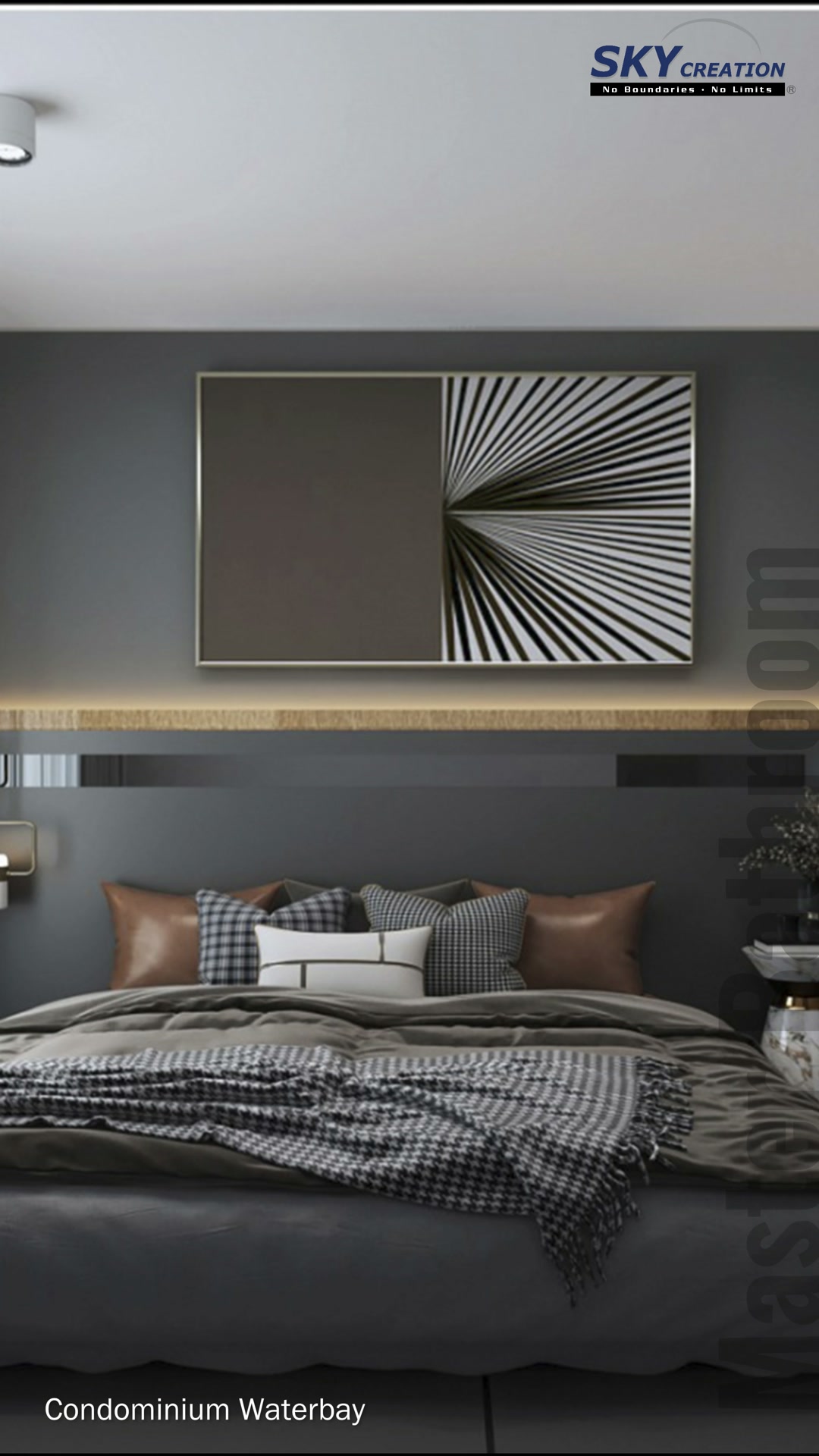 Waterbay bedroom with a grey feature wall, patterned bedding and warm lighting behind the bed