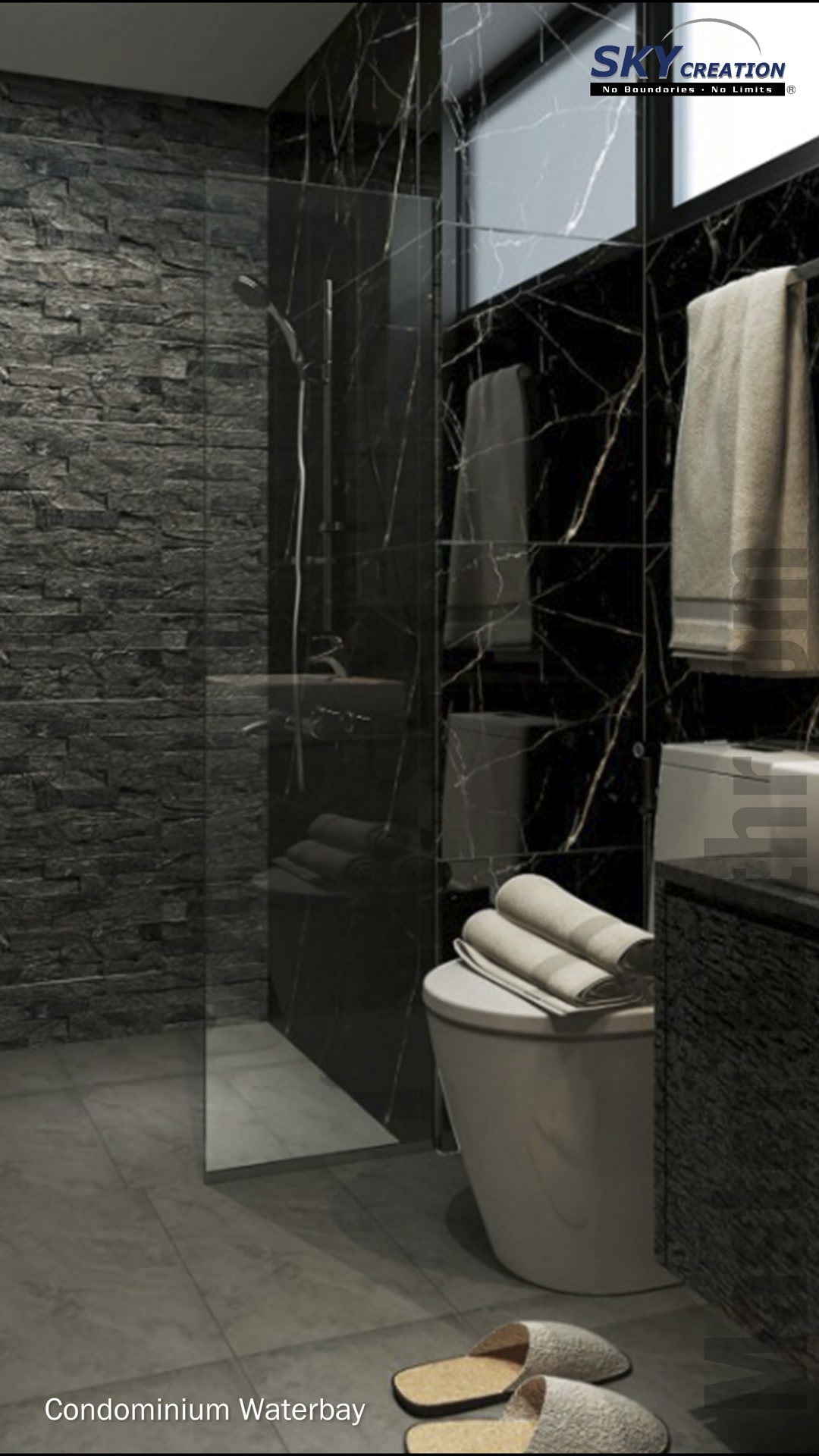 Waterbay bathroom with a rectangular basin, toilet and dark stone-look wall finishes