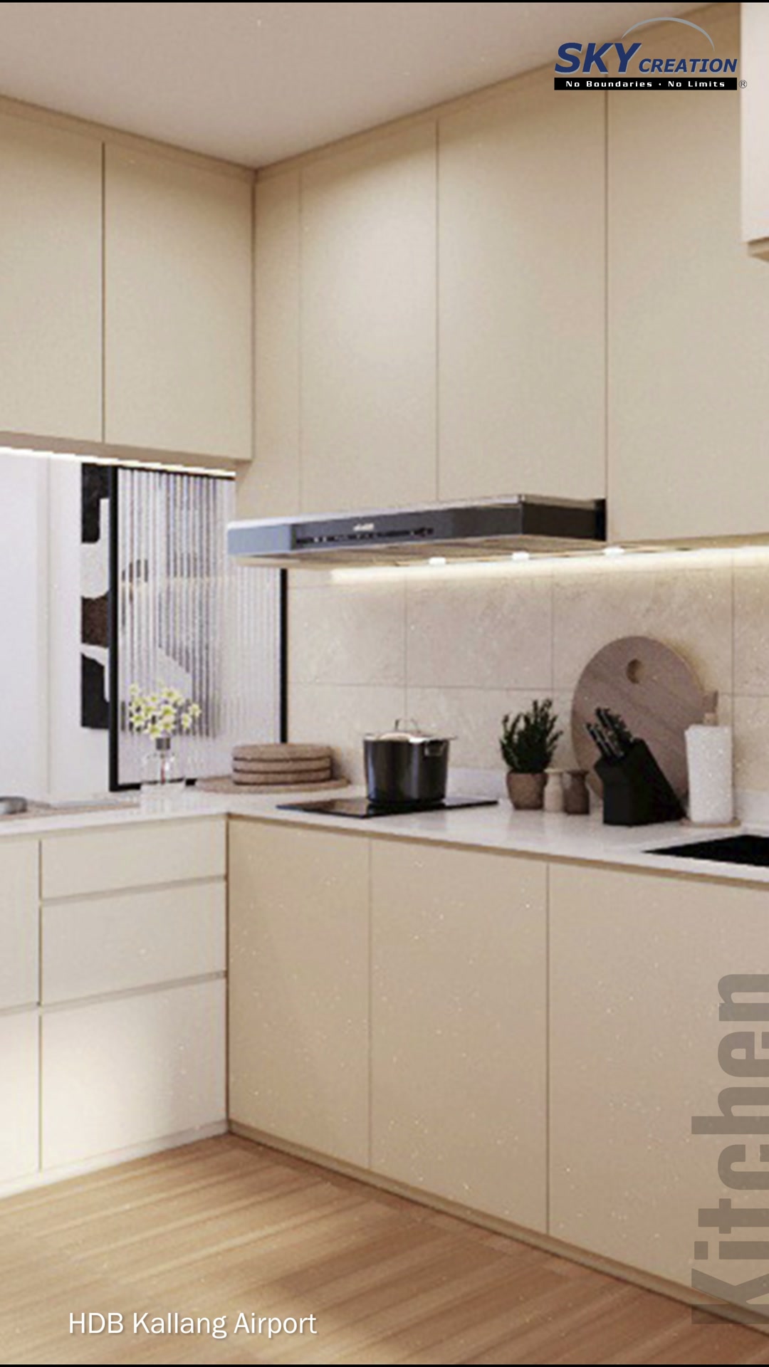 Kallang Airport kitchen corner with pale cabinets, cooking hood and wood-look flooring
