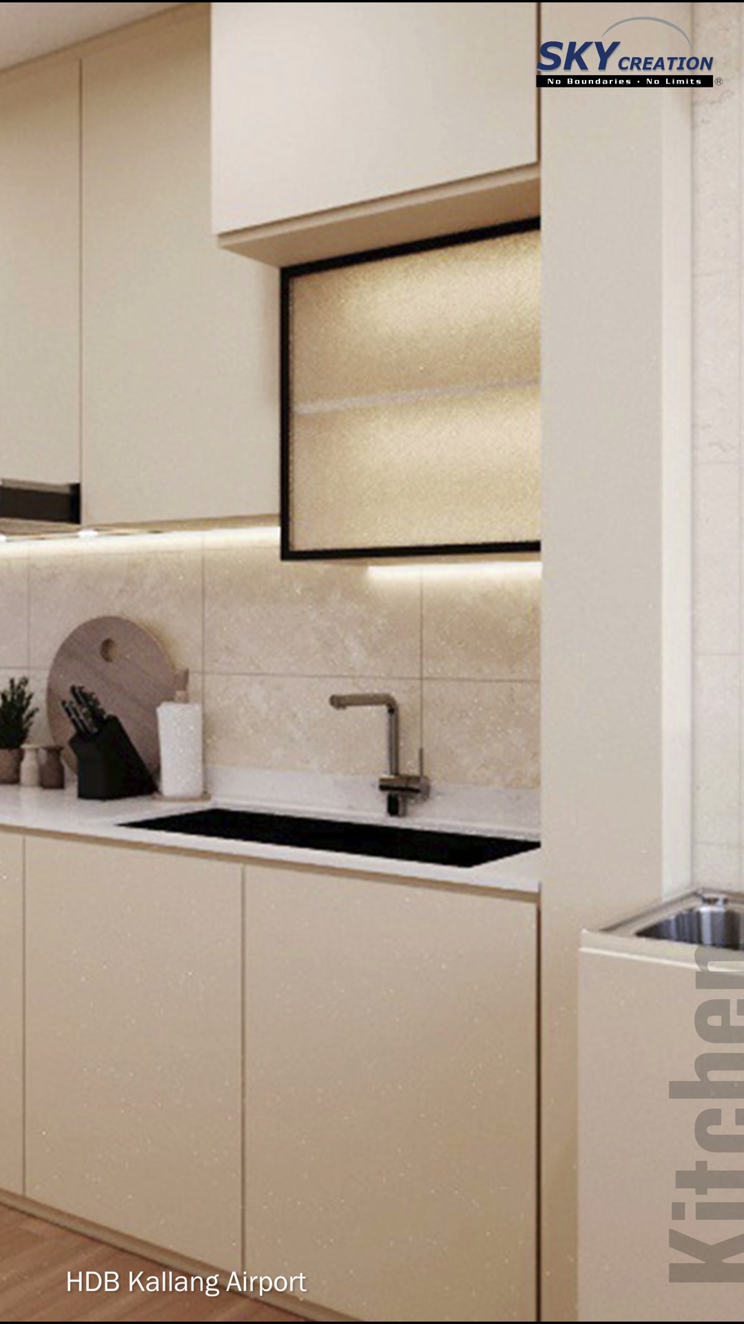 Kallang Airport kitchen sink and tap beneath a black-framed upper display niche
