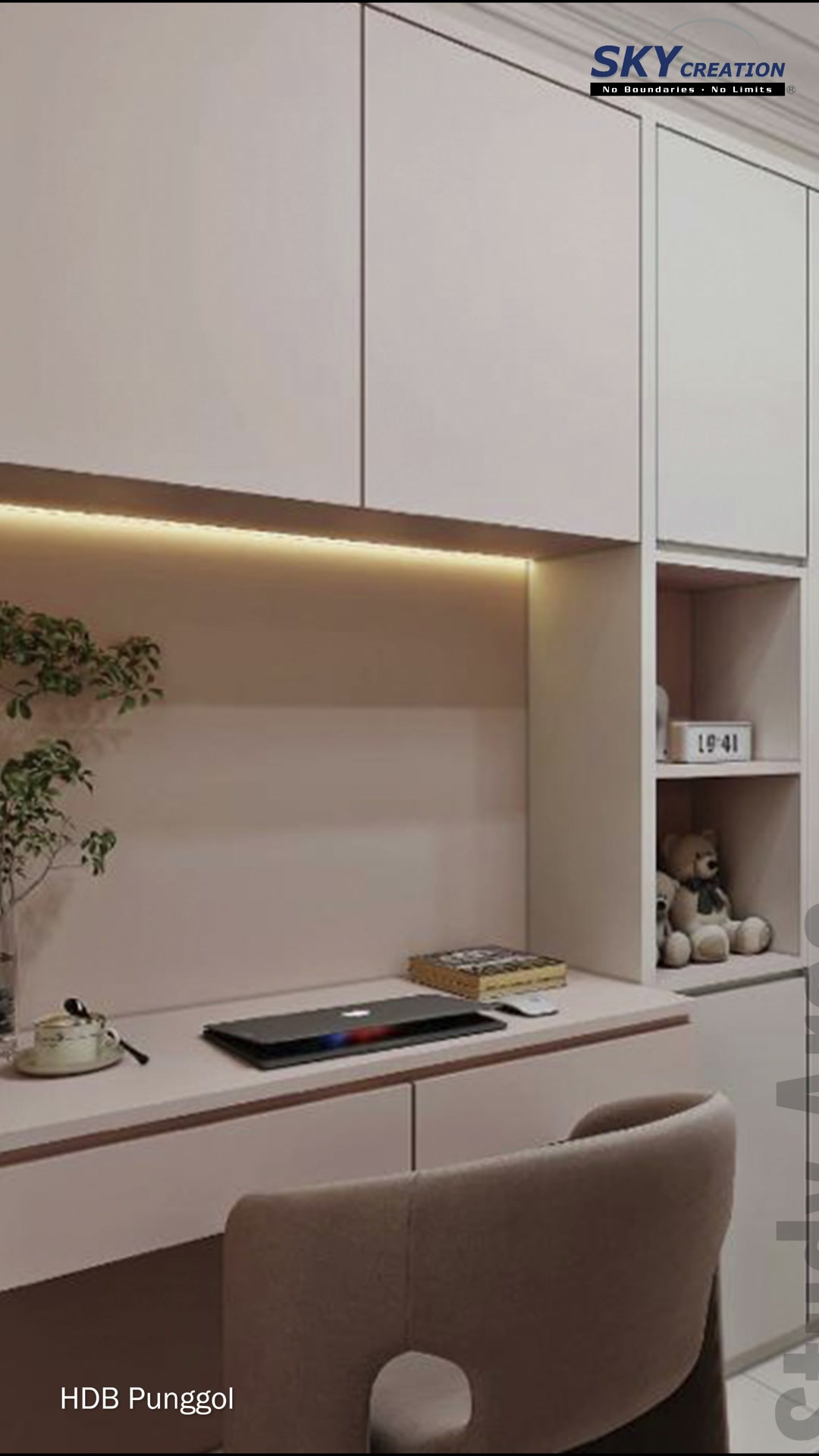 Punggol study desk with an upholstered chair and a narrow open display shelf