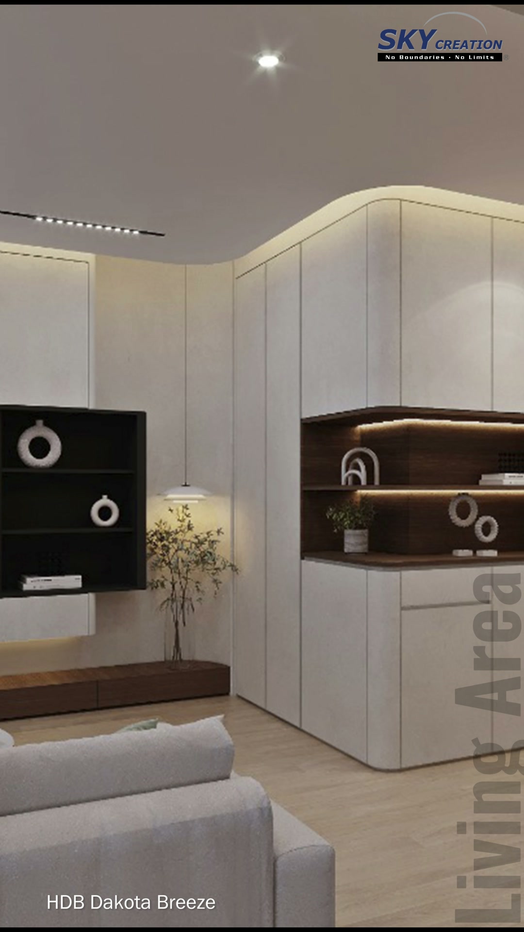 Dakota Breeze living room with curved pale cabinetry and illuminated timber display shelves