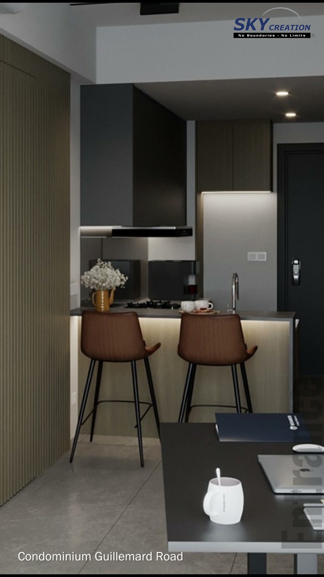 Guillemard Road kitchen with dark upper cabinets, a light counter and two brown stools