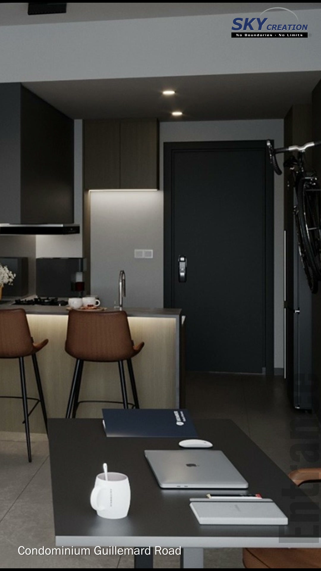 Guillemard Road kitchen and entry with a desk in the foreground