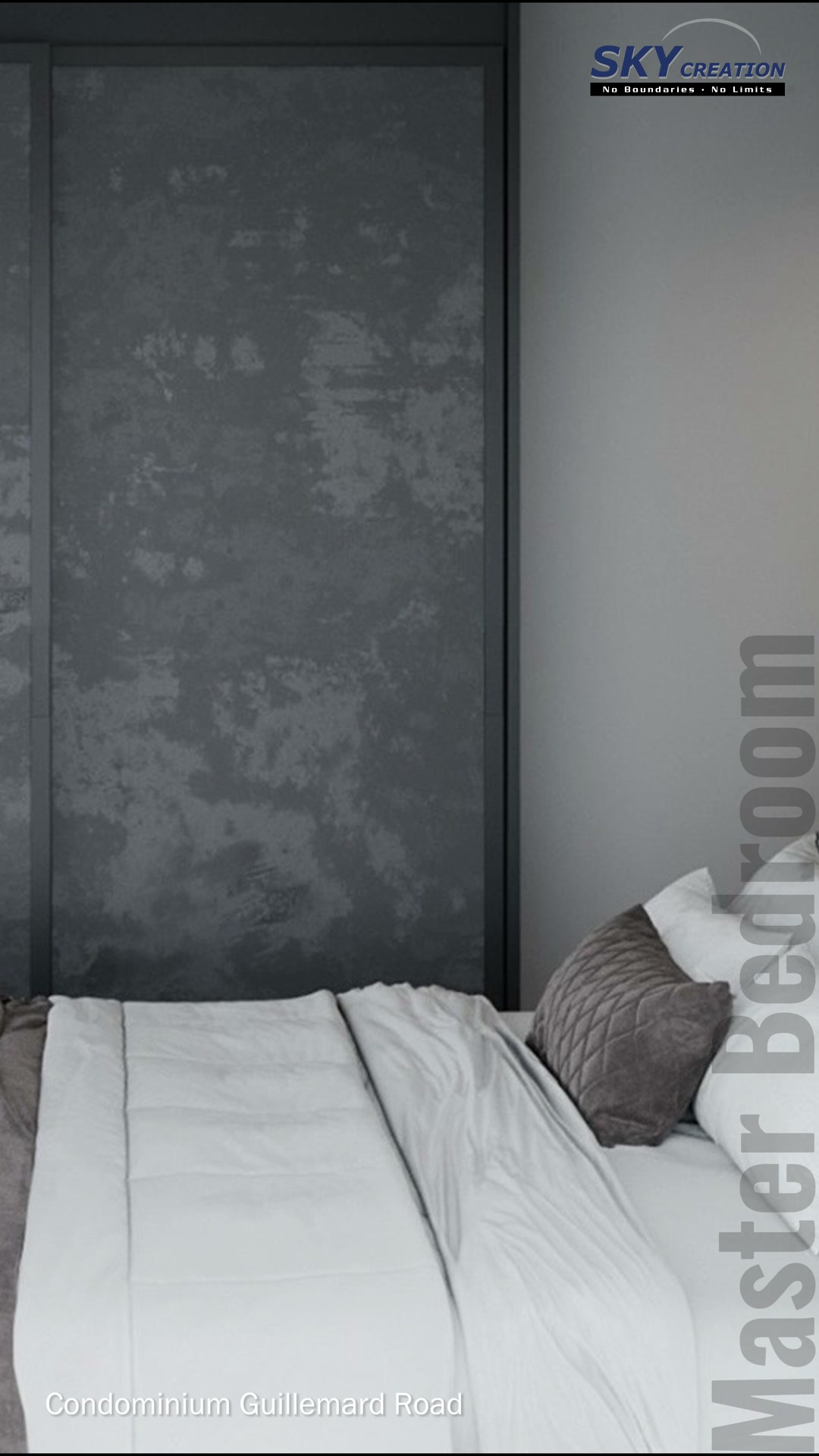 Guillemard Road bedroom showing the bed, neutral cushions and full-height grey panels