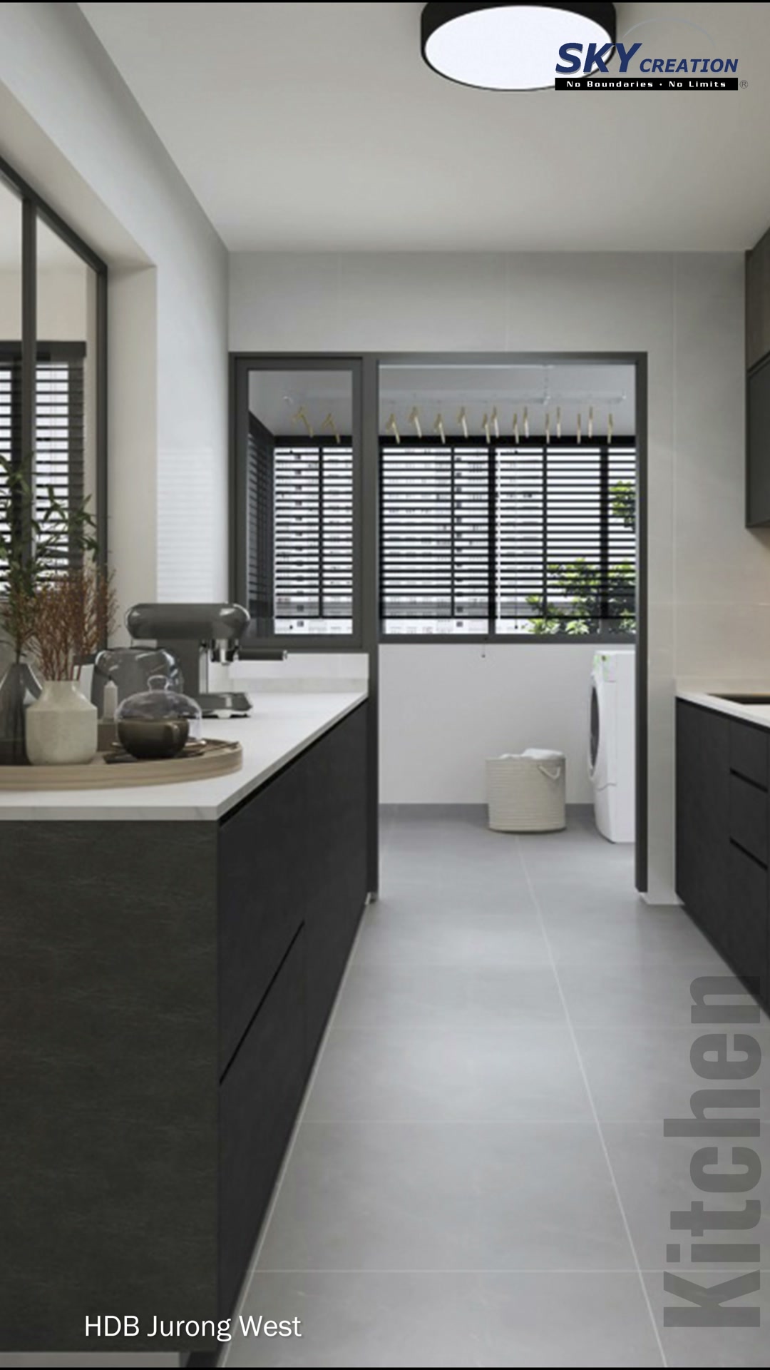 Jurong West kitchen with dark cabinets, light worktops and a black-framed opening