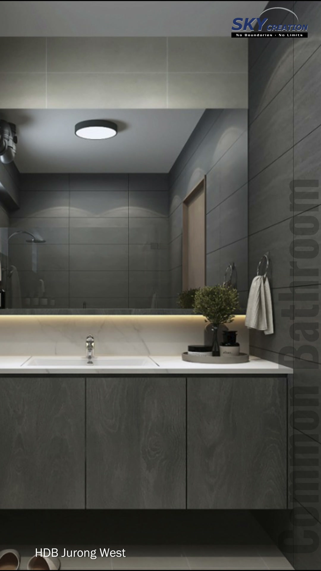 Jurong West bathroom with a full-width mirror, grey vanity and warm under-mirror lighting
