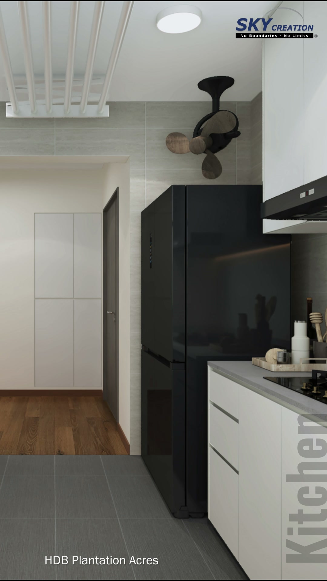 Plantation Acres galley kitchen with white cabinetry, dark appliances and grey flooring