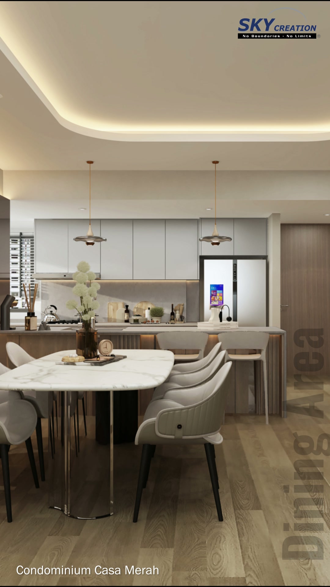 Casa Merah oval dining table and grey chairs facing the open kitchen