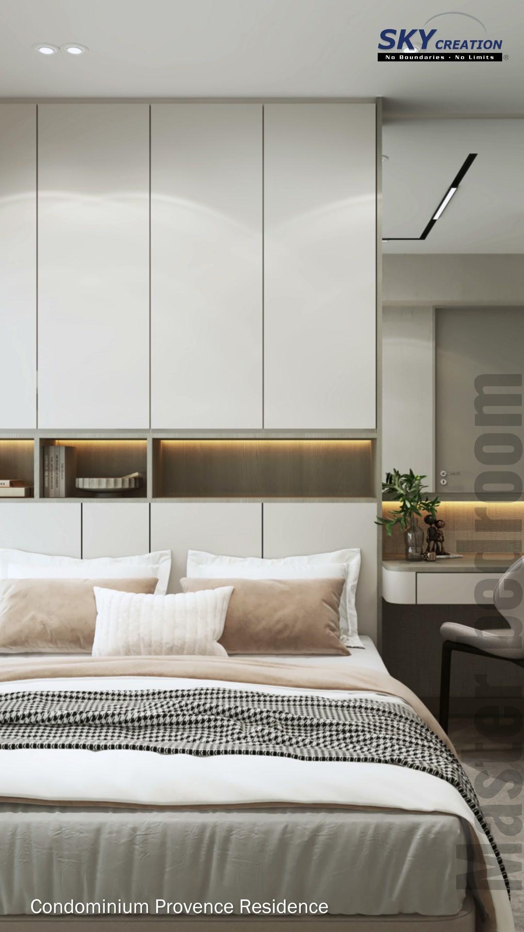 Provence Residences master bedroom with overhead cabinetry, a warm-lit niche and tall mirror