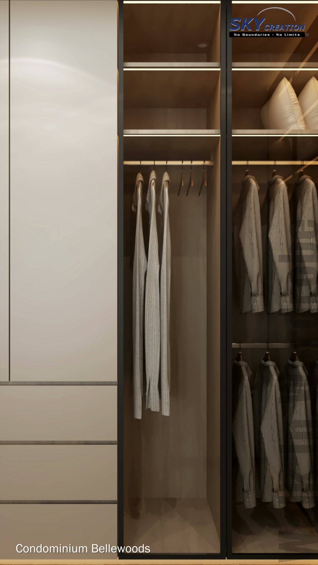 Bellewoods walk-in wardrobe with pale closed storage, tinted glass doors and warm shelf lighting