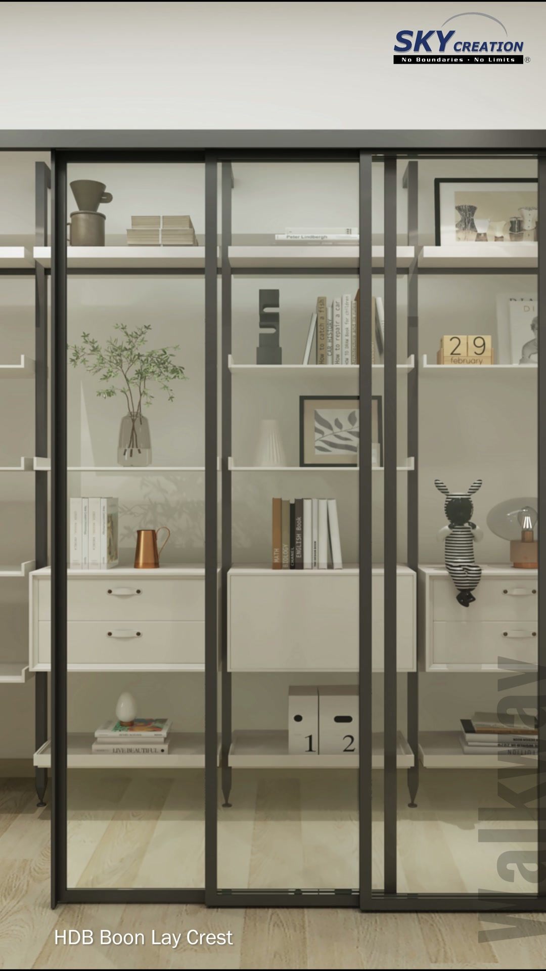 Boon Lay Crest passage divider with black-framed sliding glass panels and open display shelving