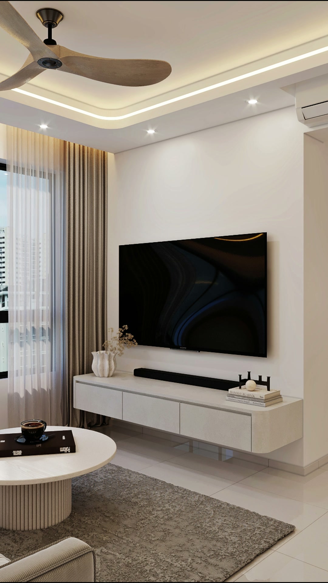 Admiralty Grove living room with a low television console, pale seating and warm recessed lighting