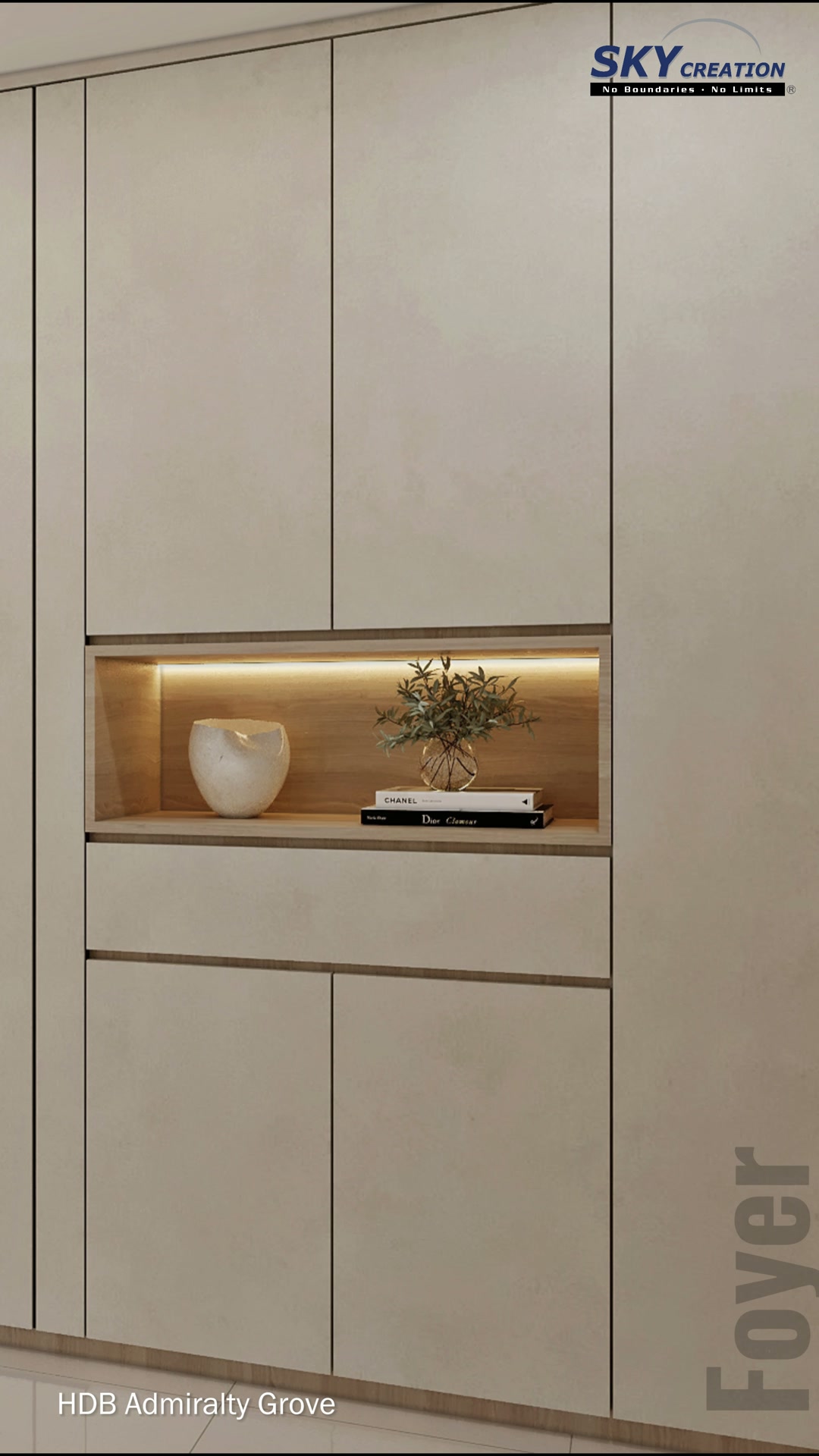Admiralty Grove bedroom storage with full-height cabinetry and an illuminated display niche