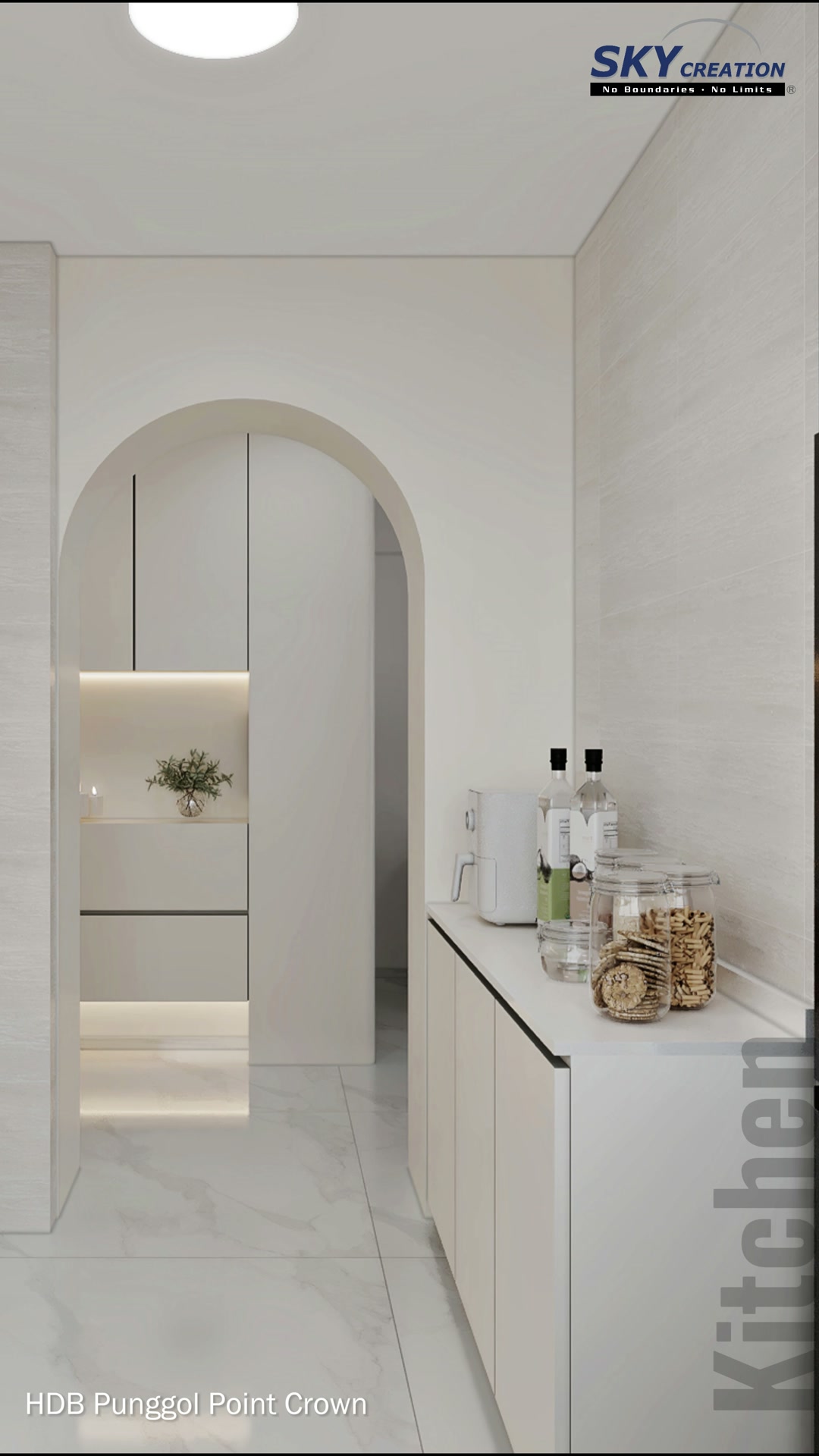 Punggol Point Crown kitchen with pale cabinets and a clear working aisle
